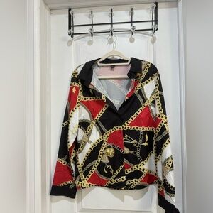 Women’s long sleeve blouse. Beautiful for work or going out.